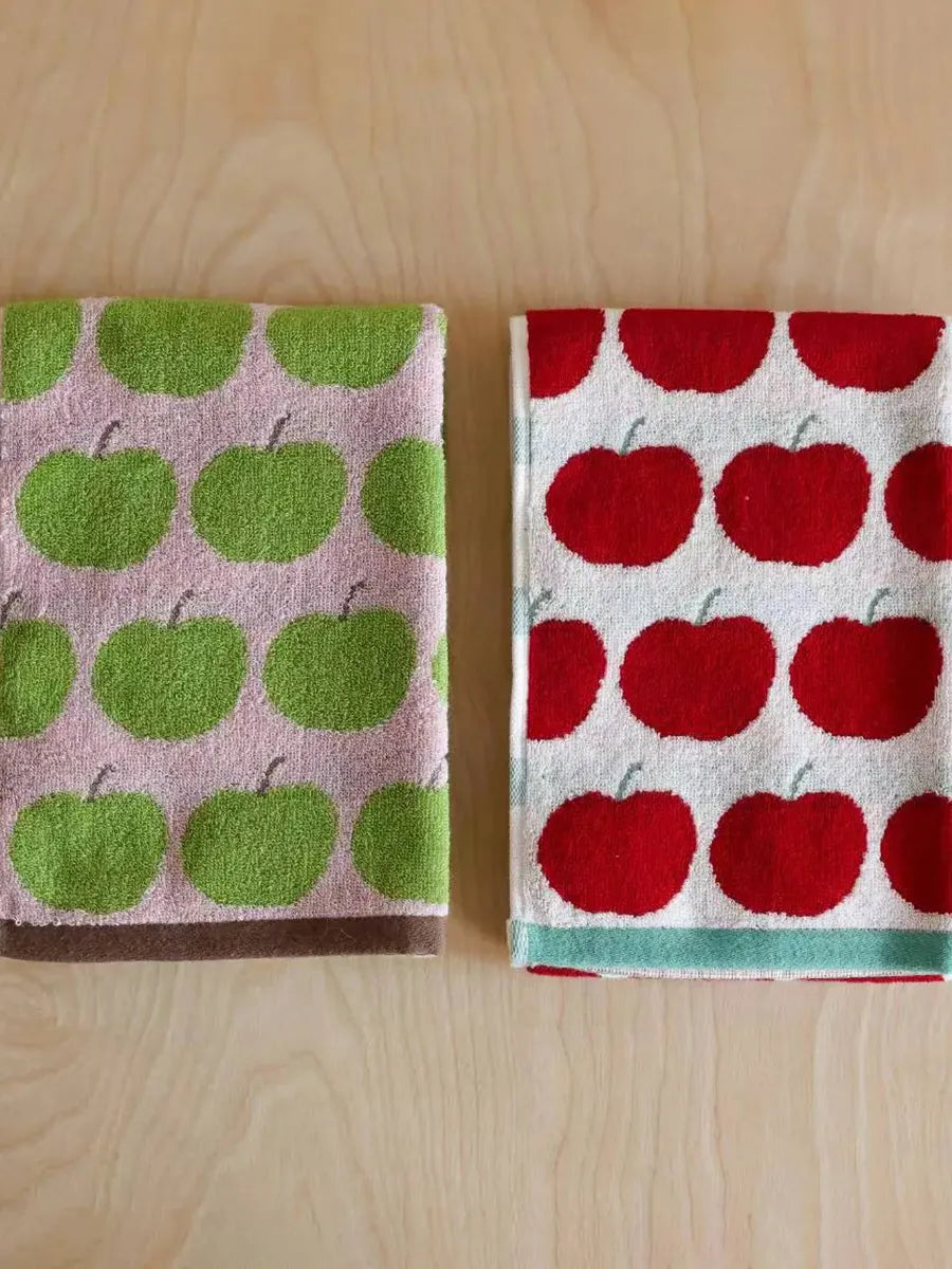 Set of Breezora Apple Terry Towels with soft, absorbent cotton fabric, featuring vibrant apple-themed designs.