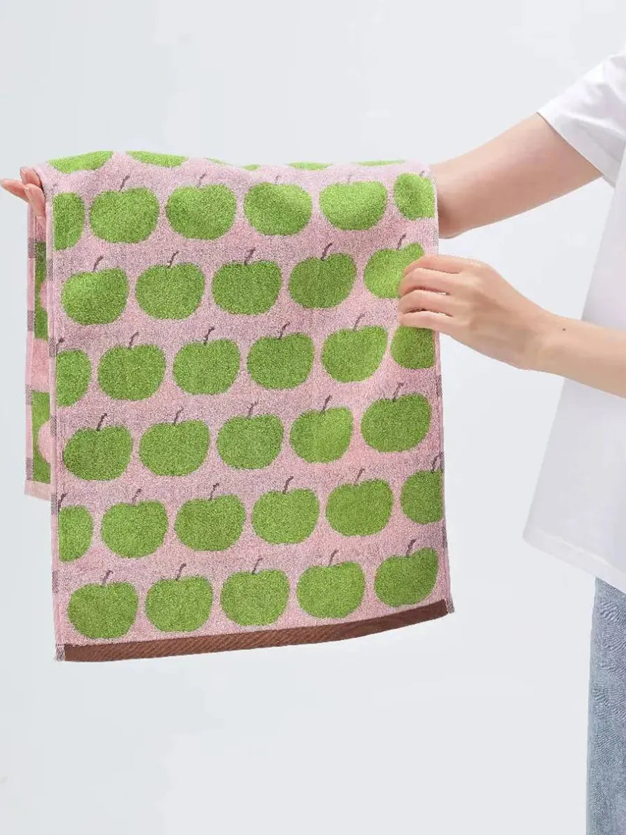 Set of four Breezora Apple Terry Towels featuring soft, absorbent terry cloth with apple-themed patterns, perfect for bathroom use.