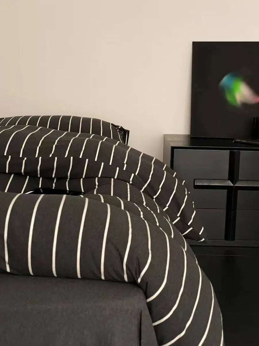 Black striped bedding set from Breezora featuring a stylish and comfortable design for bedroom decor.