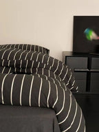 Black striped bedding set from Breezora featuring a stylish and comfortable design for bedroom decor.