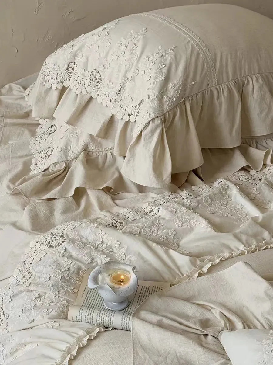 Boho linen lace bedding set by Breezora featuring intricate lace details and a soft, textured fabric in a serene color palette.