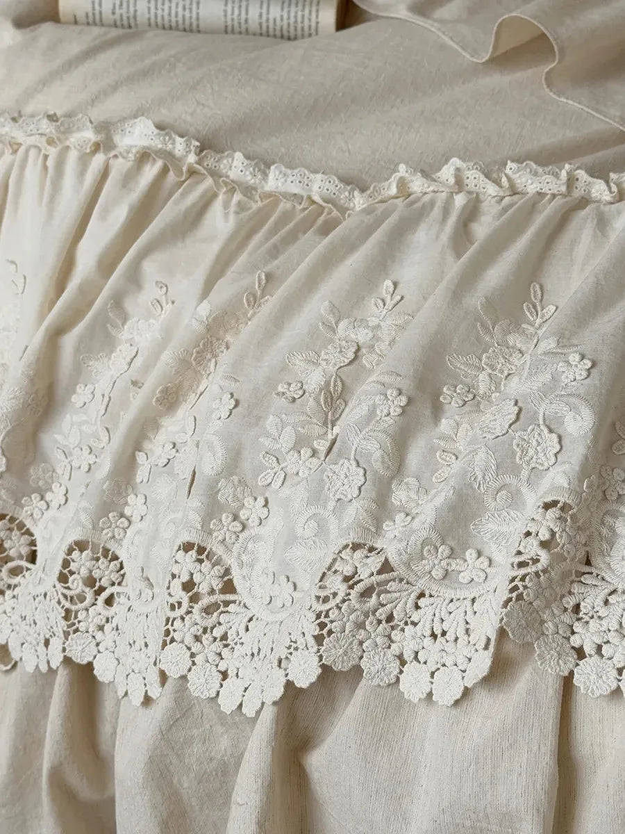 Boho linen lace bedding set by Breezora featuring intricate lace details and a soft, textured finish in neutral tones.