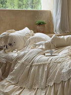 Boho linen lace bedding set by Breezora featuring intricate lace detailing and a soft, textured finish.
