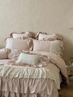 Boho linen lace bedding set by Breezora featuring intricate lace details and a soft, textured fabric in natural tones.