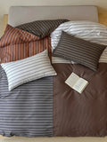 Breezora contrast striped bedding set featuring bold stripes and a cozy design for a stylish bedroom look.