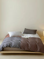 Breezora contrast striped bedding set featuring bold stripes in soft fabric, perfect for enhancing bedroom décor.
