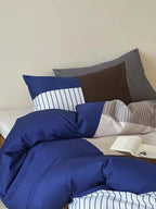 Breezora contrast striped bedding set featuring bold stripes in a stylish arrangement on soft fabric.