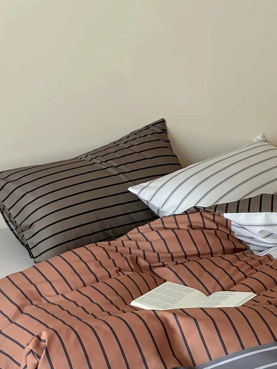 Breezora contrast striped bedding set featuring a stylish design with bold stripes in soft fabric.
