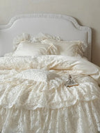 Rococo layered lace bedding set by Breezora featuring intricate lace details and soft, elegant fabric in a serene bedroom setting.