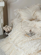 Breezora Rococo layered lace bedding set featuring intricate lace details and soft fabric in a serene bedroom setting.