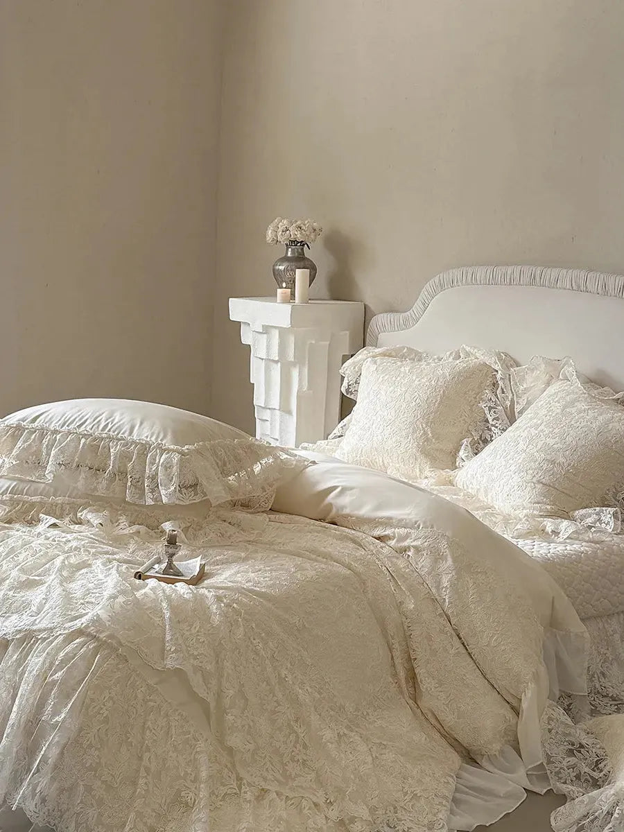 Breezora Rococo layered lace bedding set featuring delicate lace details and soft fabric in an elegant arrangement.