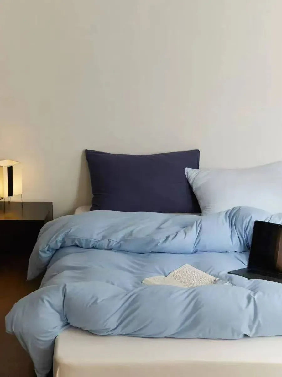 Breezora mixed color bedding set with multicolored duvet cover and pillowcases, showcasing vibrant, soft fabric for a cozy bedroom look.