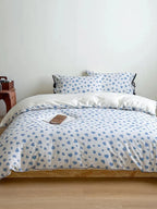 Moody Heart Printed Bedding Set by Breezora featuring a bold heart pattern on soft fabric, perfect for a cozy bedroom.