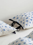 Moody Heart Printed Bedding Set by Breezora featuring a cozy design with heart patterns in soft colors.