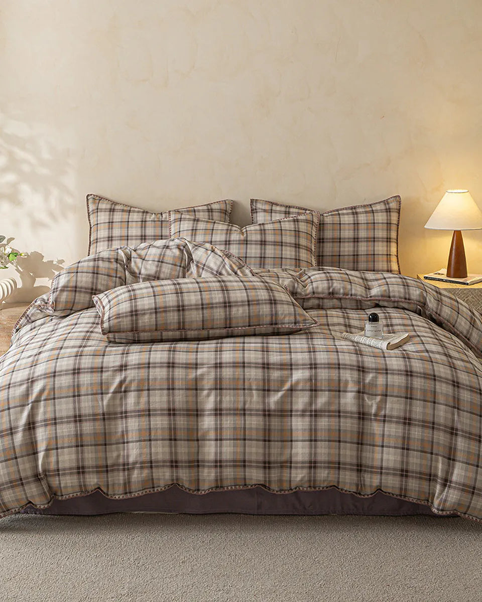 Retro plaid bedding set by Breezora featuring a cozy, layered design with warm colors and classic patterns.