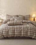 Retro plaid bedding set by Breezora featuring a cozy, layered design with warm colors and classic patterns.