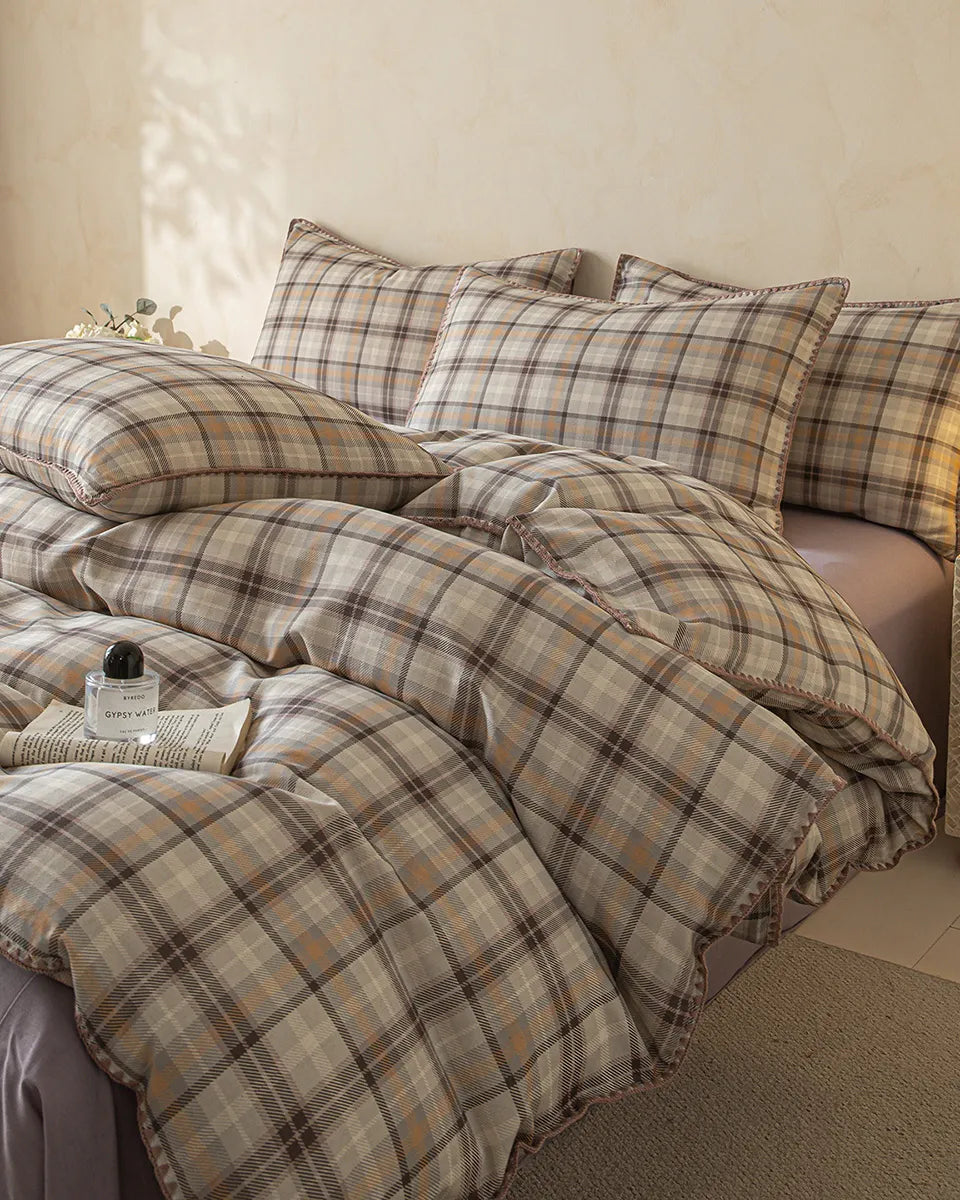 Retro plaid bedding set by Breezora featuring a cozy design with vibrant colors and a classic checkered pattern.