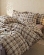 Retro plaid bedding set by Breezora featuring a cozy design with vibrant colors and a classic checkered pattern.