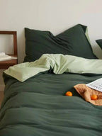 Reversible jersey cotton bedding set by Breezora featuring soft, cozy sheets and pillowcases with a versatile design.