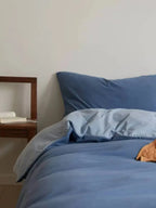 Reversible jersey cotton bedding set by Breezora, showing soft, smooth fabric with a cozy, double-sided design for comfortable sleep.
