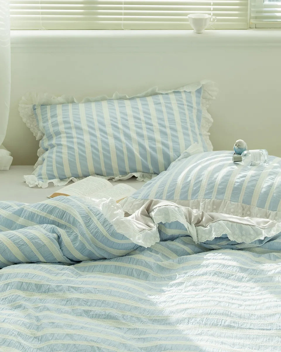 Striped jacquard bedding set featuring lace ruffle by Breezora, showcasing intricate patterns and elegant design.