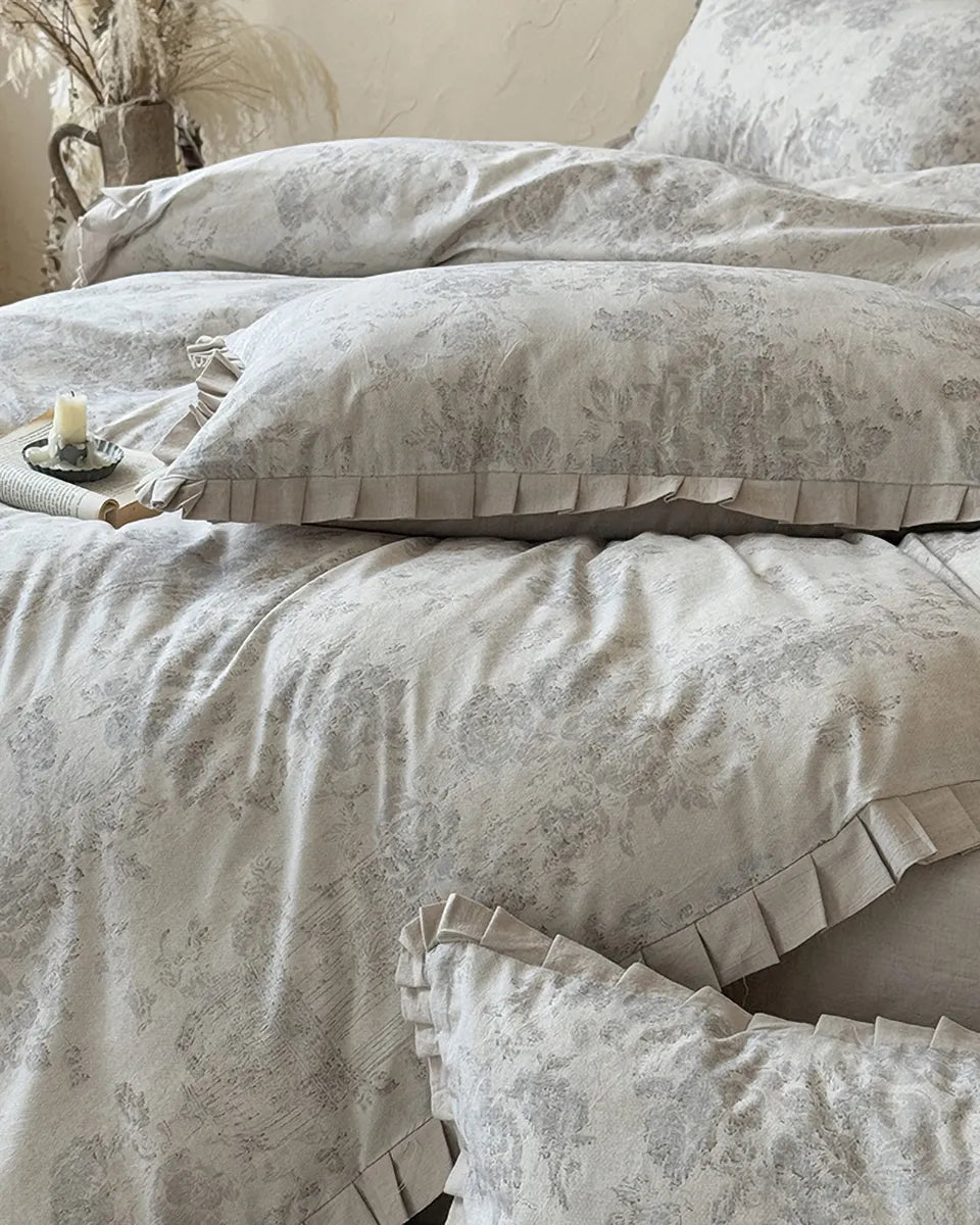 Vintage floral bedding set from Breezora featuring intricate flower patterns on soft fabric for a cozy bedroom aesthetic.
