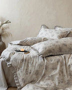 Vintage floral bedding set by Breezora featuring a colorful floral pattern on soft fabric.