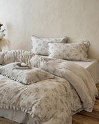 Vintage floral bedding set by Breezora featuring intricate patterns on soft fabric, ideal for a cozy bedroom aesthetic.