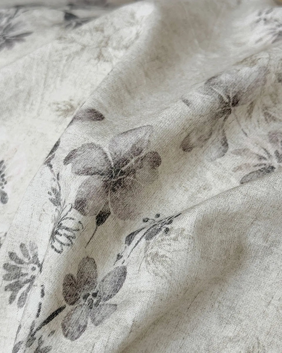 Breezora vintage floral bedding set featuring intricate flower patterns on soft fabric, enhancing cozy bedroom decor.