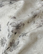 Breezora vintage floral bedding set featuring intricate flower patterns on soft fabric, enhancing cozy bedroom decor.