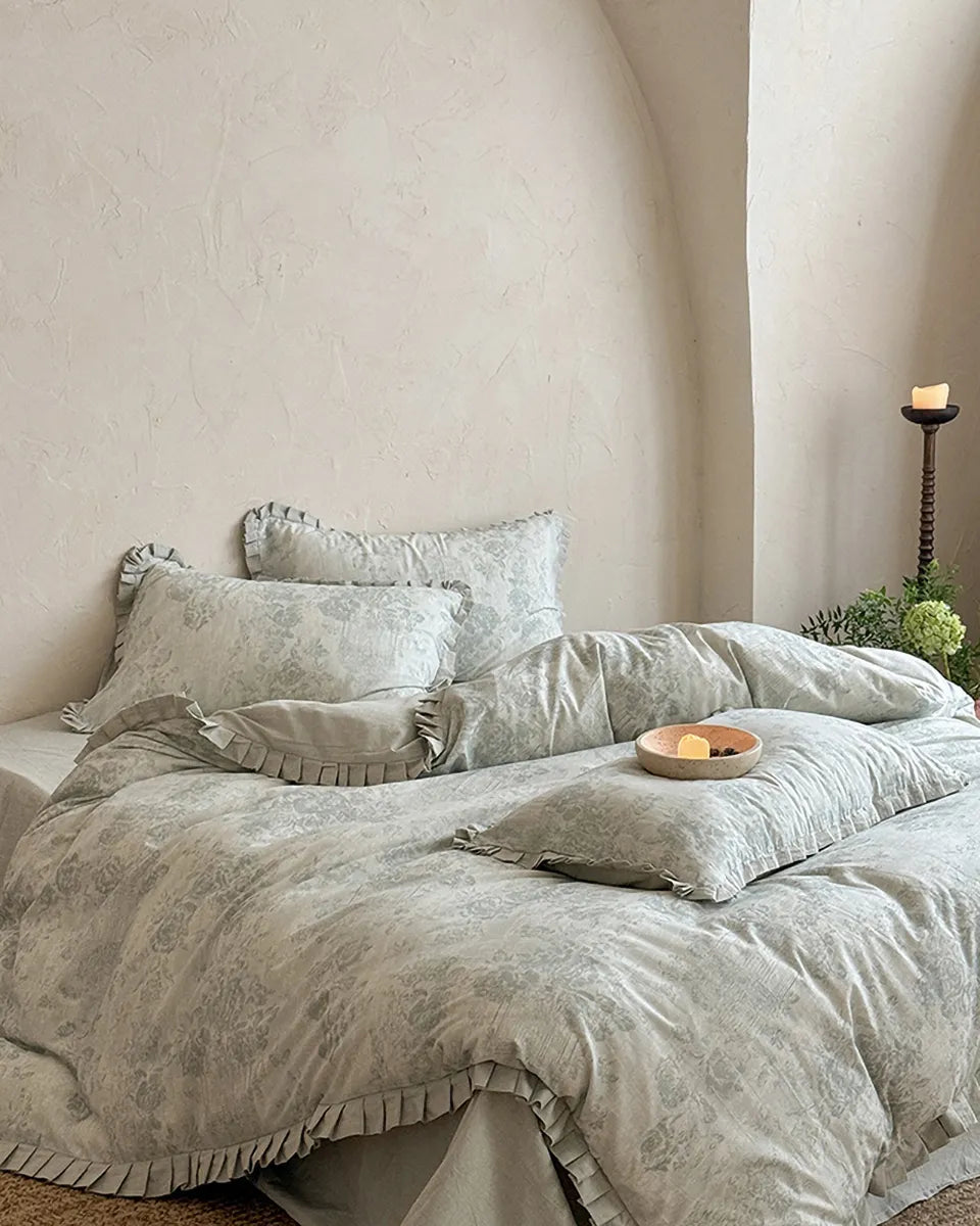 Breezora vintage floral bedding set featuring a colorful floral pattern on soft fabric, ideal for a charming bedroom decor.